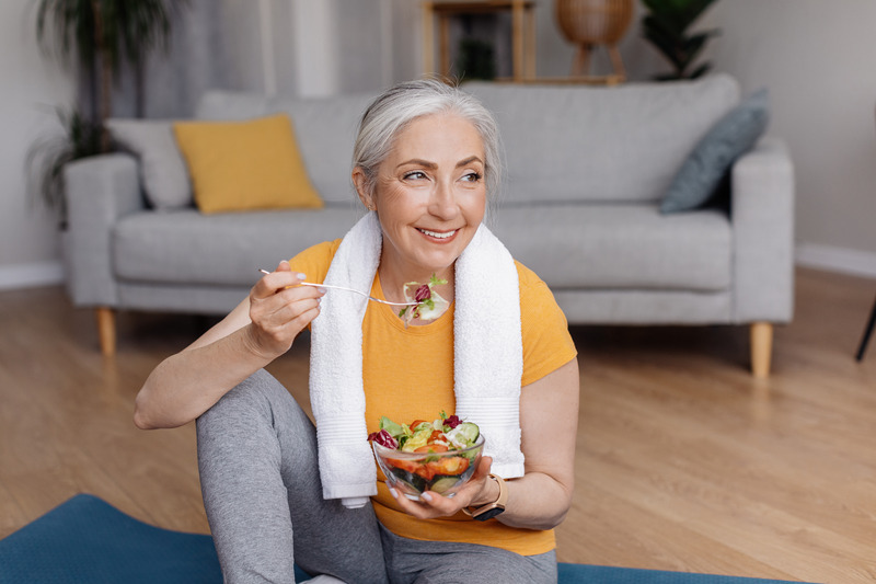 Patient with dentures eating healthy